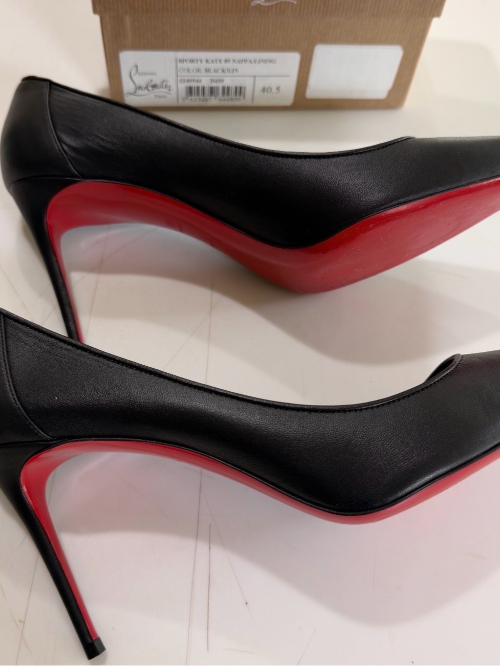 Christian Louboutin Black Leather Pointed Toe Pumps with Red Soles